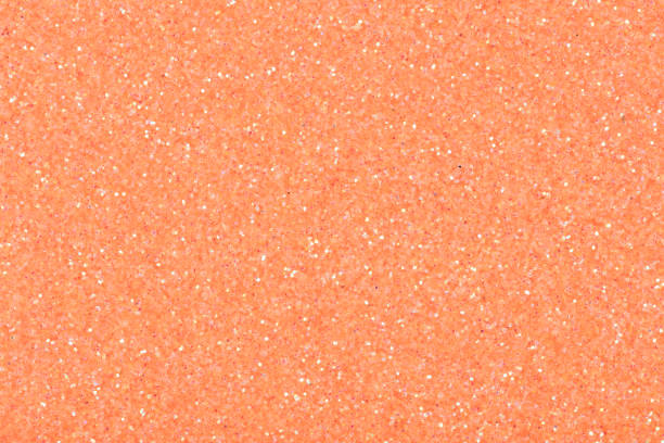 istock Glitter background in light peach tone, shiny texture for design. 1194240580