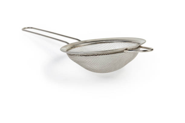 istock Round stainless steel sieve on a white background 1194242672