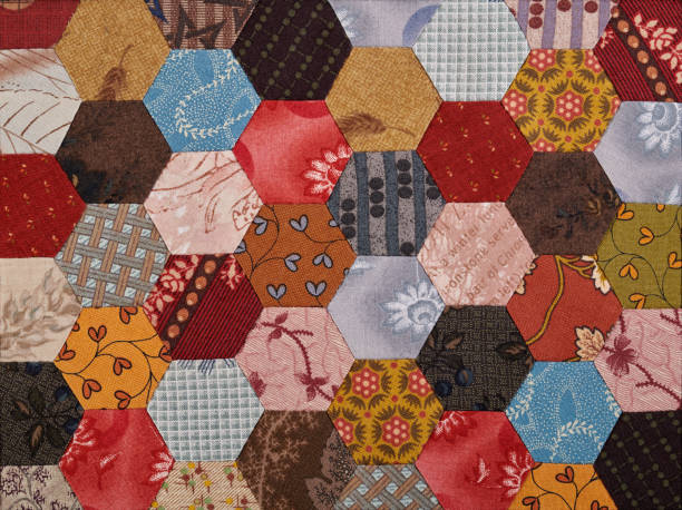 istock Charm quilt fragment consisting of colored bright hexagons 1194245766