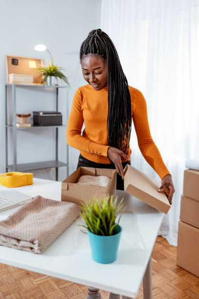 istock Young woman working at home 1194246531