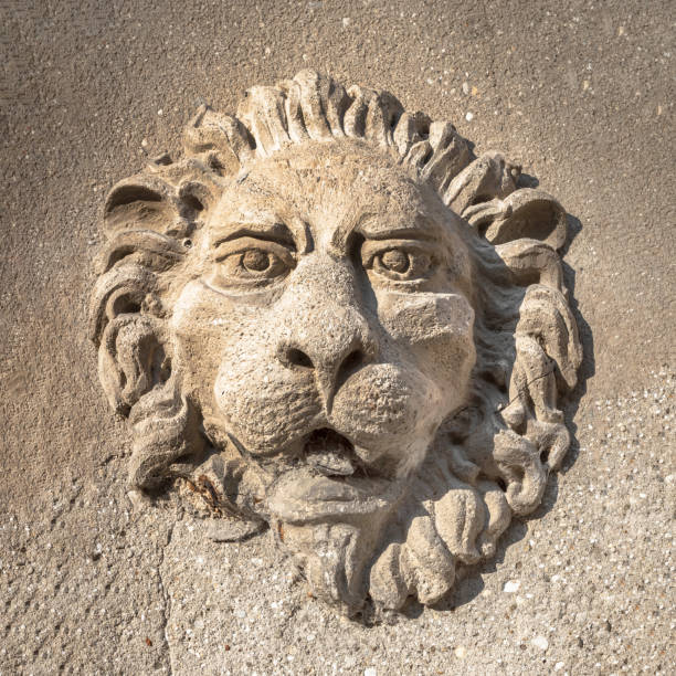 Antique lion statue , made of stone, with copy space. Concept security, safety, guard