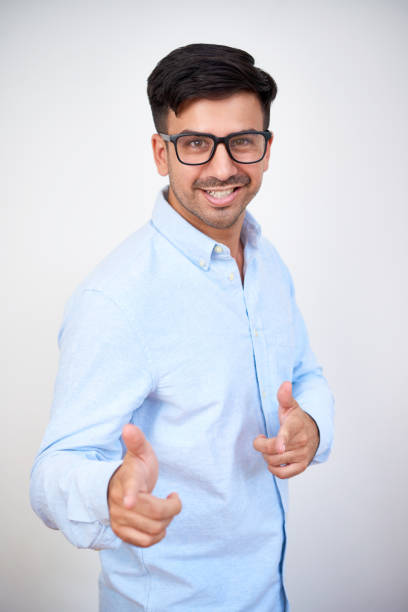 istock Businessman pointing with finger guns 1194247415