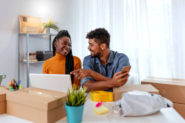 istock Successful Young couple with their small business online 1194247577