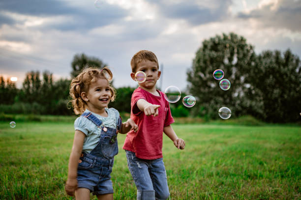 istock Beautiful kids running in nature 1194248491