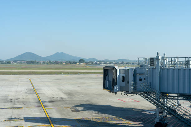 istock Bridge for connect the airplane at airport. 1194248943