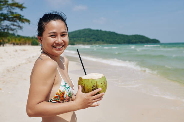 istock Pretty woman with fresh cocktail 1194249665