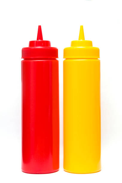 istock Ketchup and mustard bottle isolated on white background 1194249815