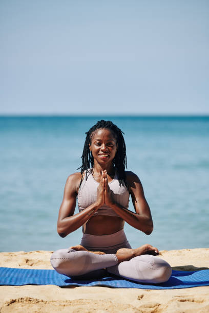 istock Pretty woman in lotus position 1194249894