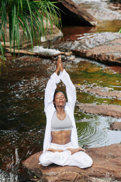 istock Meditating calm young woman 1194249928