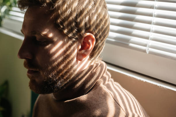 istock Portrait of a Man With Shadow on his face 1194254549