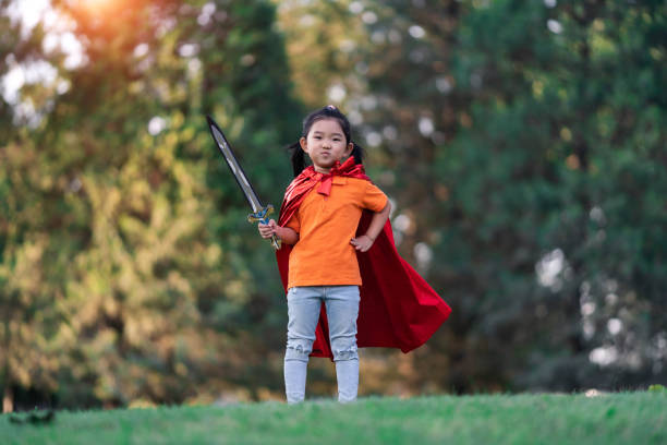 istock Wonder Girl Holding a Sword 1194255274