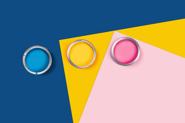 istock Multicolor background with three color paint jars. 1194255344