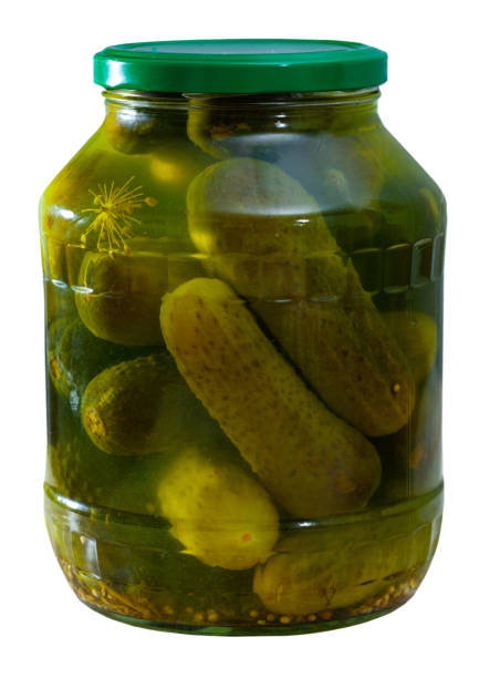 istock Marinated cucumbers in glass jar 1194255822