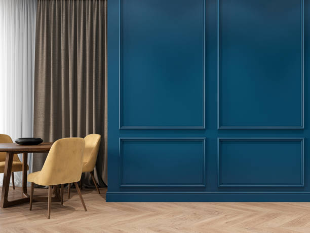 istock Modern classic blue interior with moldings, wood floor, dinner table, yellow chairs and curtains. 3d render interior mock up. 1194256078