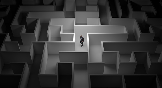 3d rendering of a man lost in the center of a maze