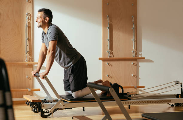 istock A Man Doing Reformer Pilates 1194258088