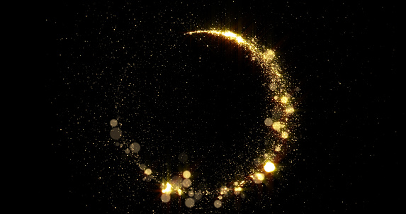 Círculo de luz brillante de oro con partículas brillantes con efecto de destello de deslumbramiento. Fondo de Navidad y Año Nuevo, marco de anillo de confeti dorado abstracto con rastro de brillo brillante mágico photo
