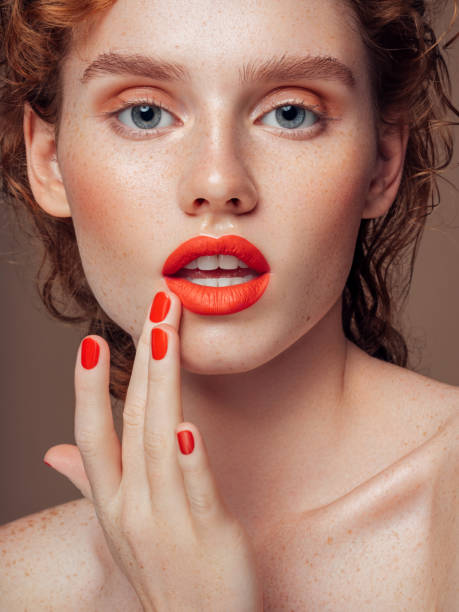 istock Woman with red lips and manicure 1194260587