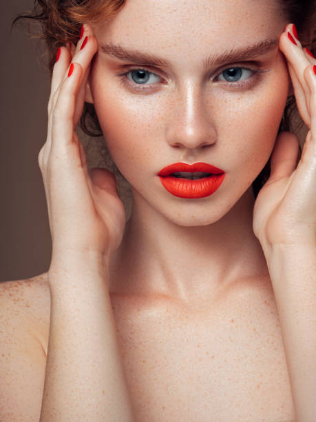 istock Woman with red lips and manicure 1194260821