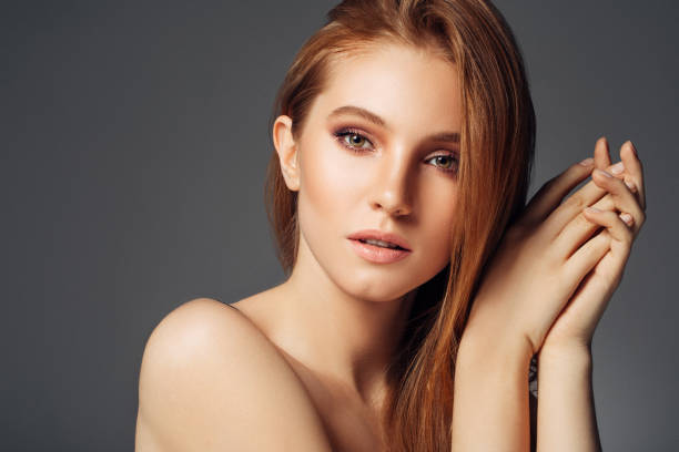 istock Young woman with red hair 1194261056