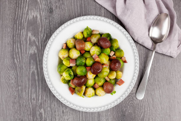 istock Roasted brussels sprouts with bacon and chestnuts 1194264791