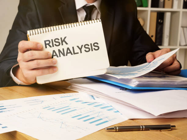 istock Text sign showing hand written words risk analysis 1194272027