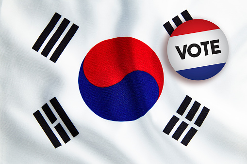 Vote Badge over South Korean Flag. Horizontal composition with copy space.