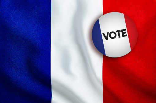 Vote Badge over French Flag. Horizontal composition with copy space.