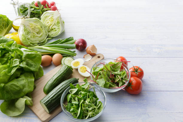 salads: ingredients for salad still life - bibb lettuce imagens e fotografias de stock