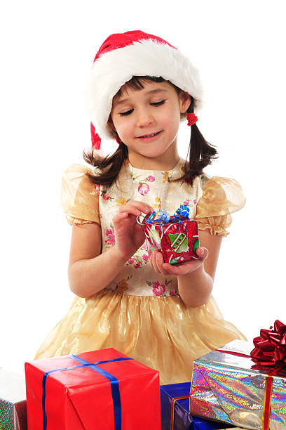 istock Smiling little girl unpacked a Christmas gift box 119427459