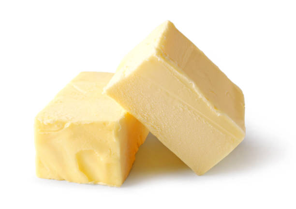 istock pieces of butter isolated on white background 1194276391