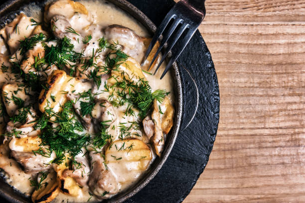 istock delicious hot pan with potato and meat 1194278523