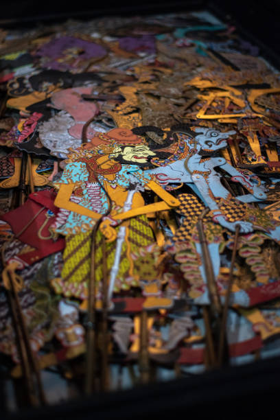 Shadow Puppets A myriad of colorful designs on a set of Javanese shadow puppets used in the Wayang Kulit. The Wayang Kulit is an essential part of Javanese storytelling. wayang kulit photos stock pictures, royalty-free photos & images