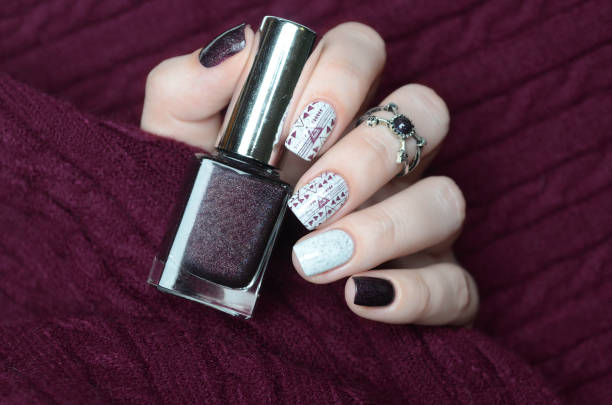 istock white wine plum manicure with geometric design 1194278840