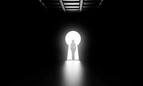 istock dark room with a shaped key door 1194279617