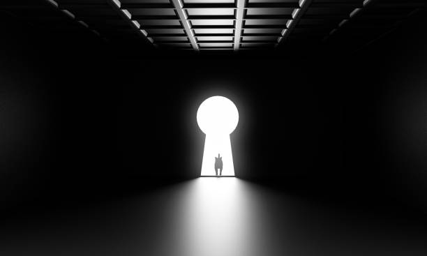 istock dark room with a shaped key door 1194279692