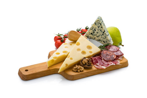 istock Cheeses and cured meat isolated on white background 1194280160