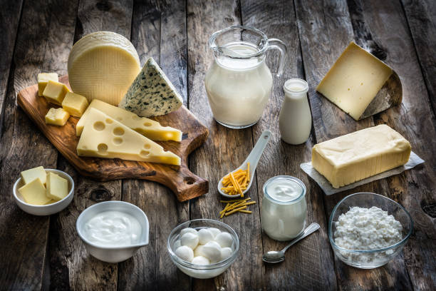 istock Assortment of dairy products on rustic wooden table 1194280935