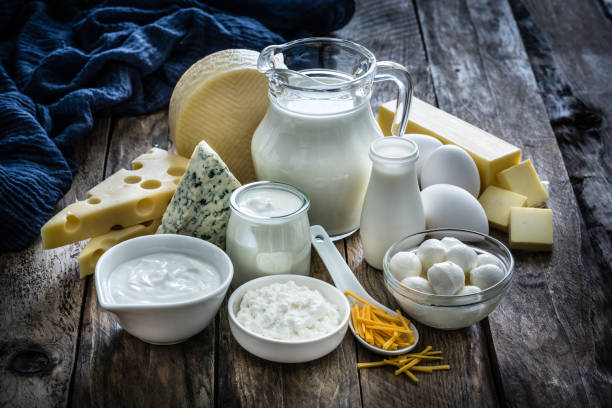 istock Assortment of dairy products on rustic wooden table 1194281004
