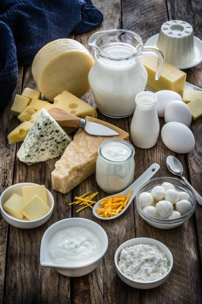 istock Assortment of dairy products on rustic wooden table 1194281125
