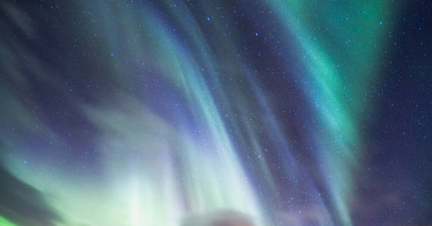 istock Northern lights, Aurora borealis with starry in the night sky 1194284587