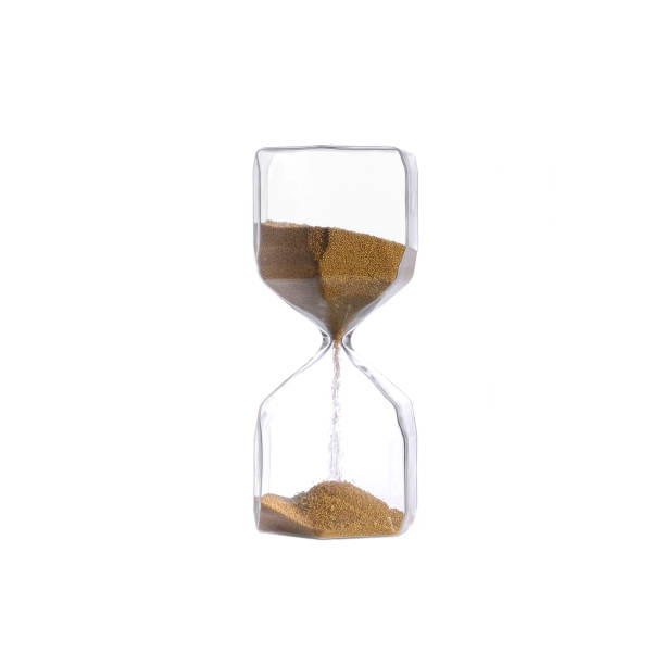 istock Hourglass gold sand glass isolated on white background 1194286069