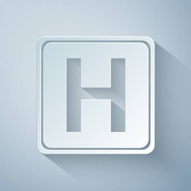 istock Paper cut Hospital sign icon isolated on grey background. Paper art style. Vector Illustration 1194287602