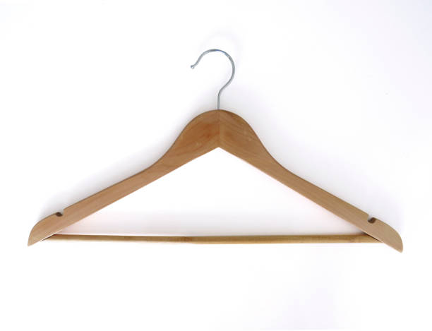 istock Isolated NATURAL WOOD HANGER WITH BAR. White Background 1194288671