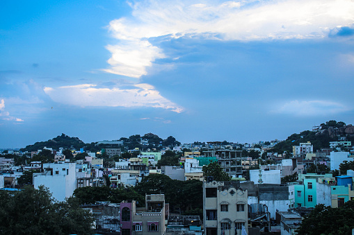 This photo was taken from a rooftop in a small urban town in Hyderabad.
