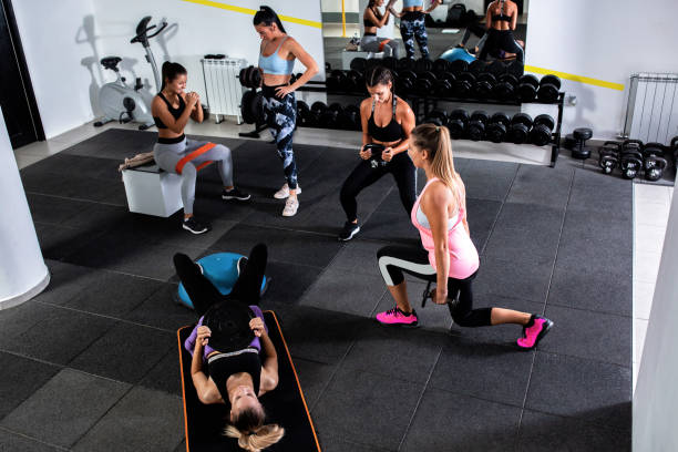 istock Group of women doing leg workouts 1194294075
