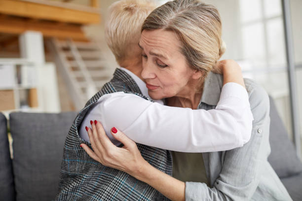 istock Grateful Patient Embracing Female Psychologist 1194294342