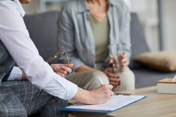 istock Cropped Image of Woman in Therapy Session 1194294369