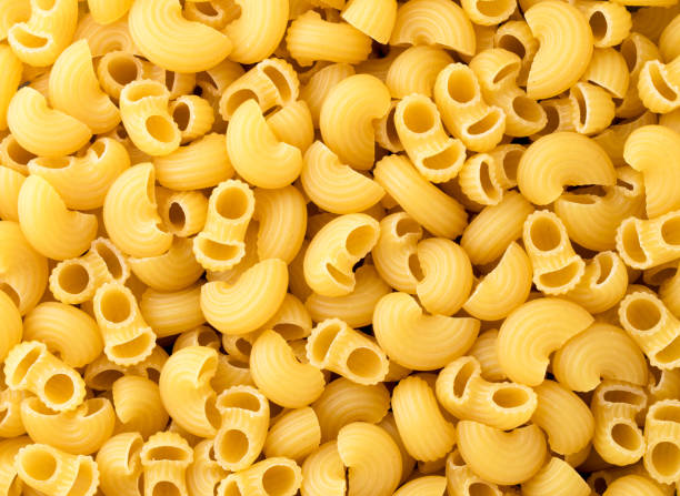 istock Raw pasta closeup, background. The view of top. 1194297076