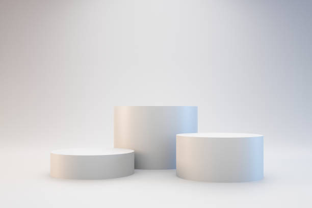 istock Modern podium or pedestal display with platform concept on white background. Blank shelf stand for showing product. 3D rendering. 1194297499